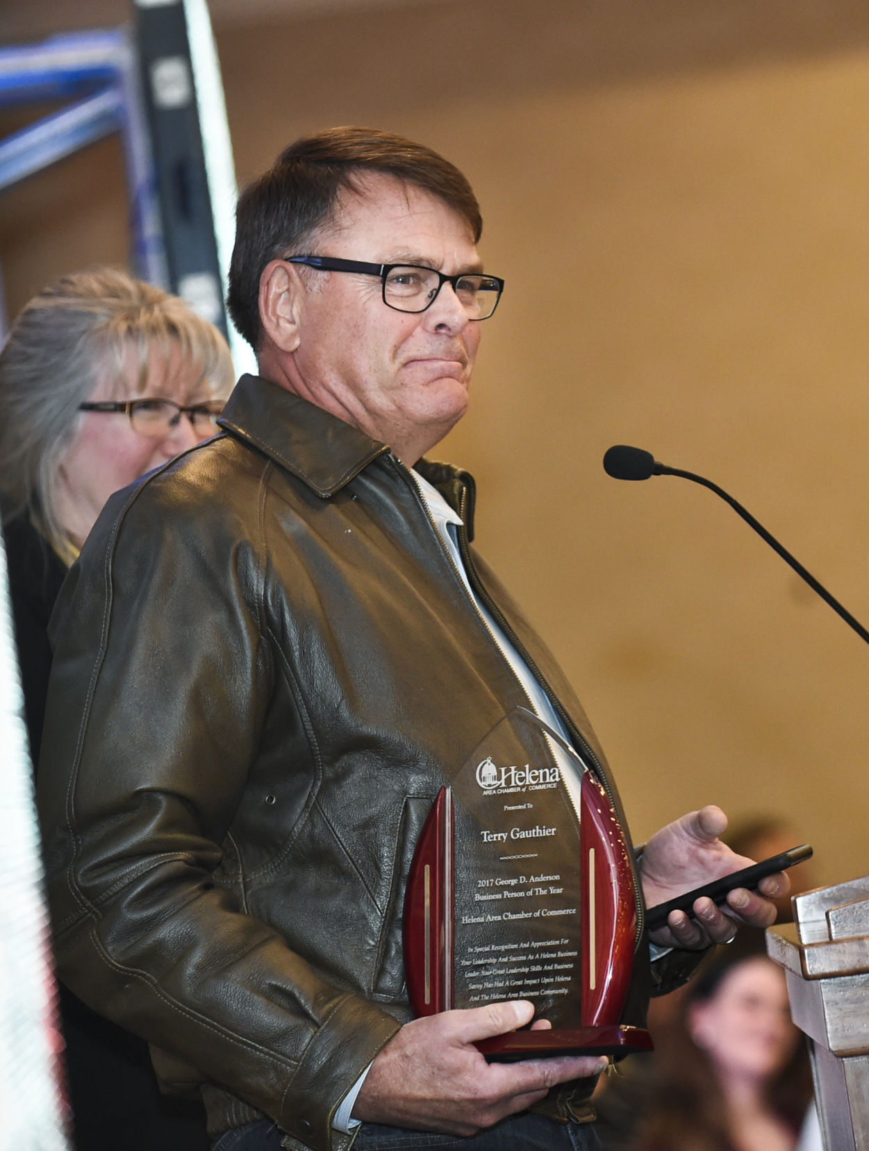 Terry Gauthier accepts the George Anderson Business Person of the Year award during the annual Helena Area Chamber of Commerce luncheon on Thursday.